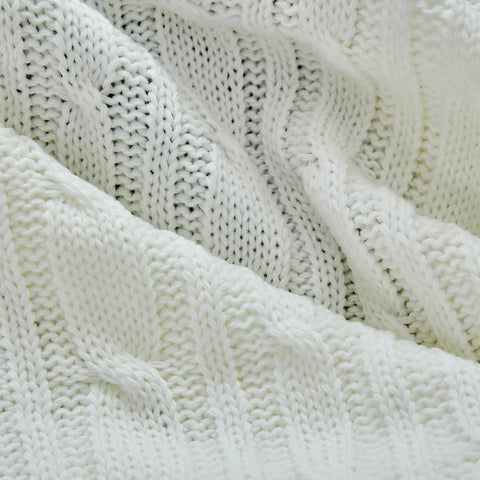 Plaid Karaca Home en maille torsadée certifié Oeko-Tex, blanc cassé